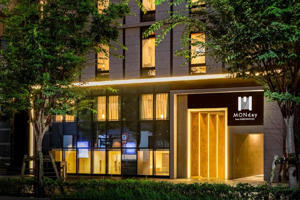 a building with a monday sign in front of it at hotel MONday Kyoto Karasuma Nijo in Kyoto