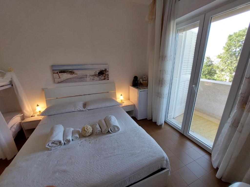 A bed or beds in a room at Casa di Sofia