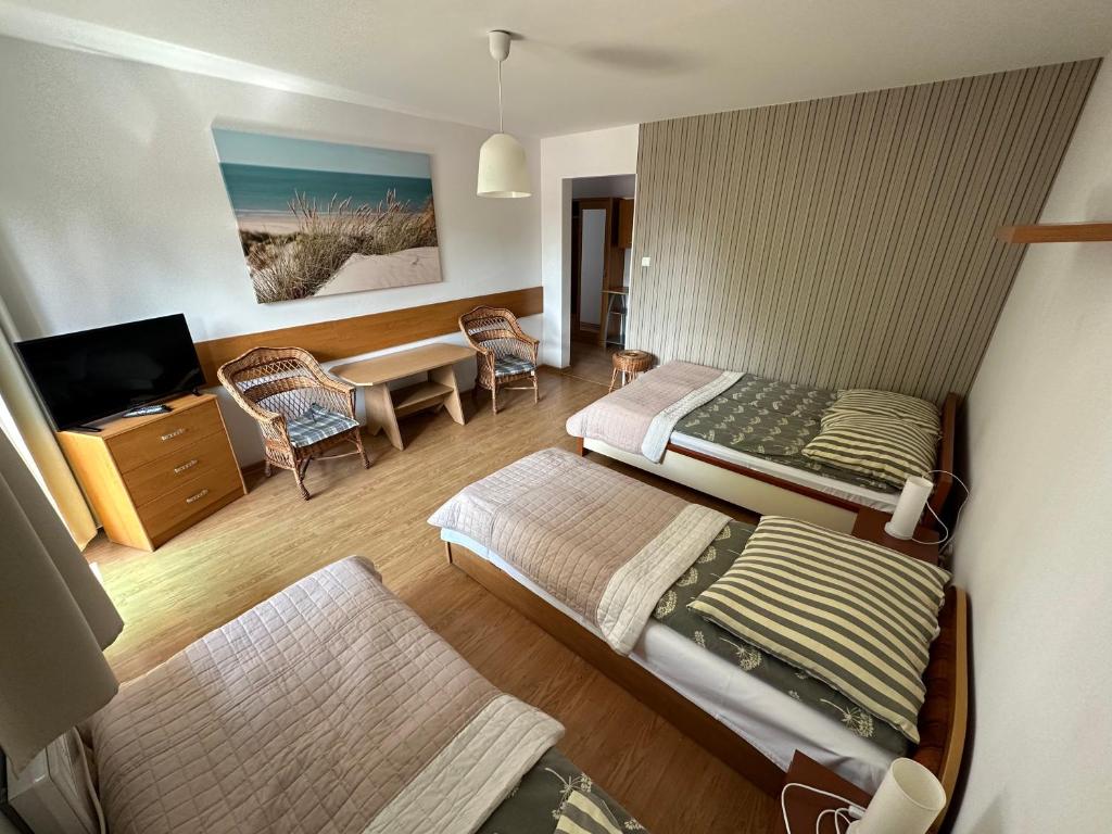 Postel nebo postele na pokoji v ubytování Villa Horyzont