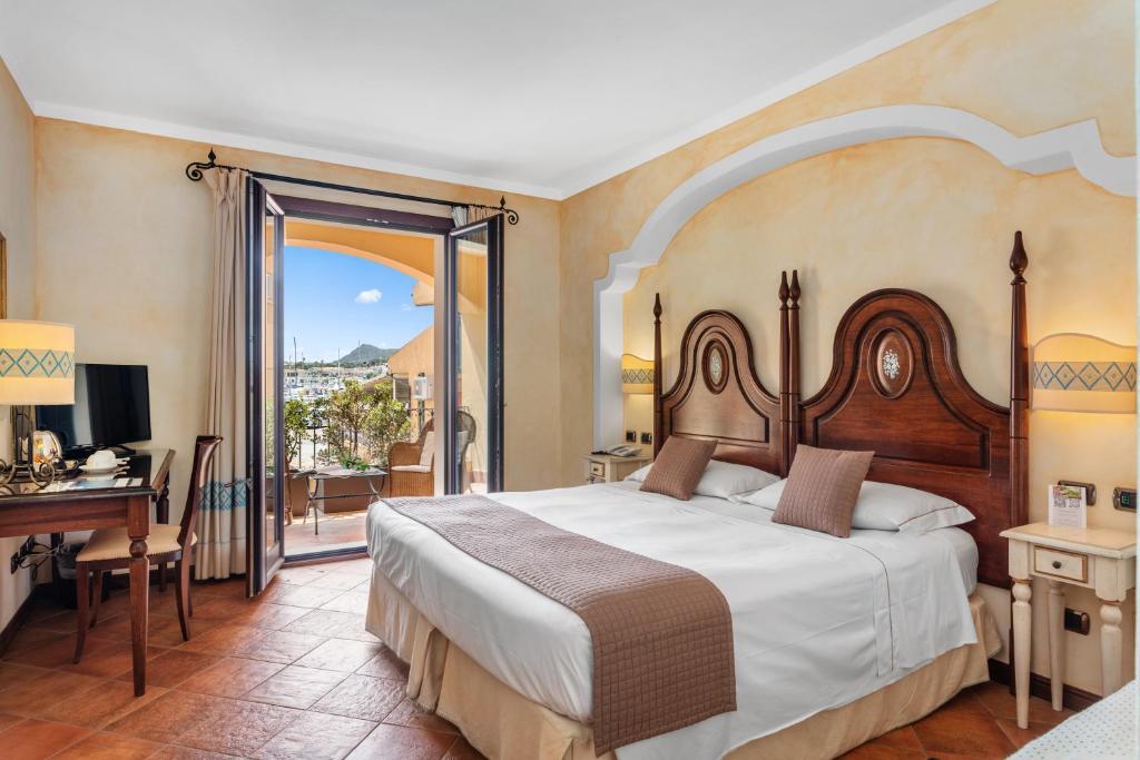 Postel nebo postele na pokoji v ubytování La Vecchia Fonte Boutique Hotel
