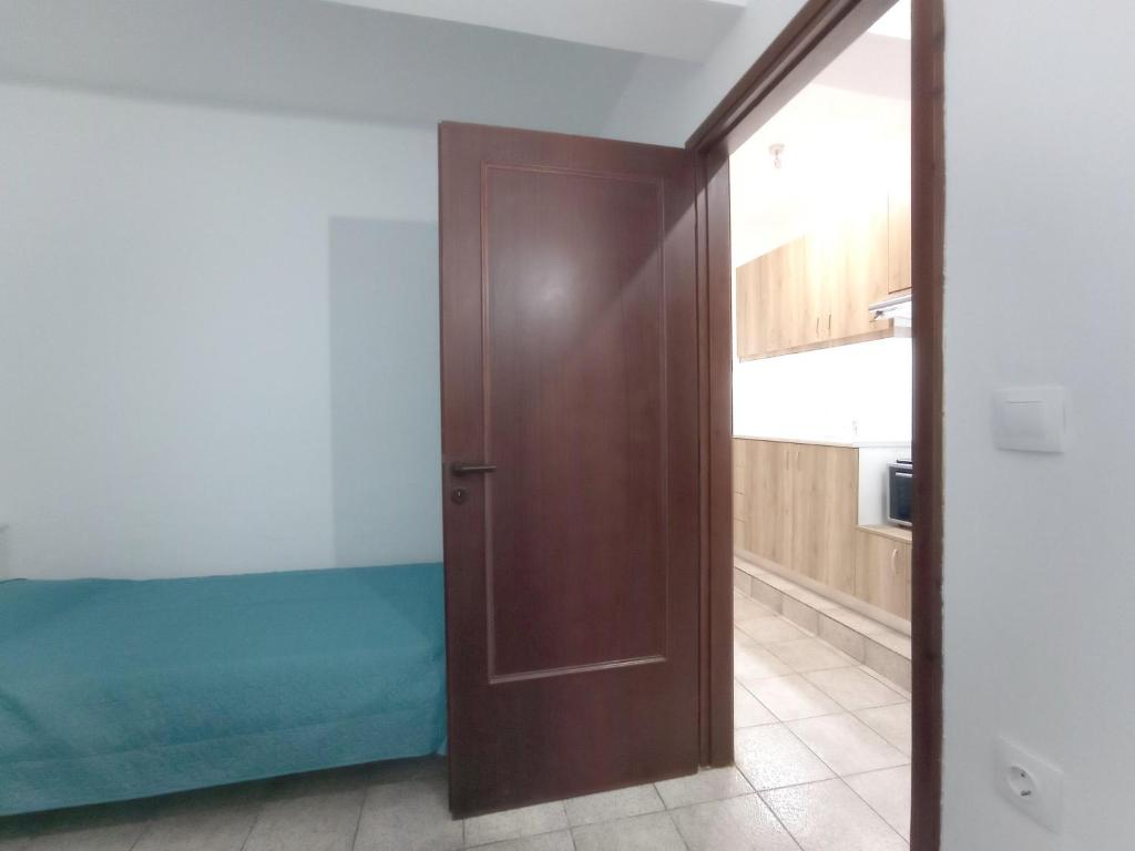 Postel nebo postele na pokoji v ubytování Flower Apartments