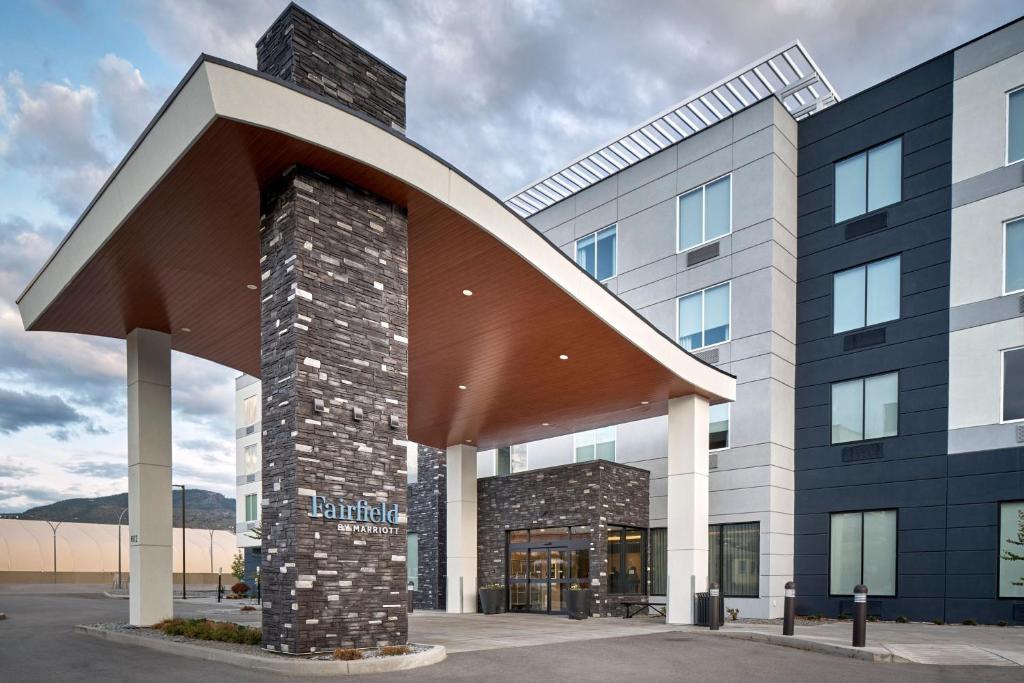 a large building with a large arch in front of it at Fairfield Inn & Suites by Marriott Penticton in Penticton