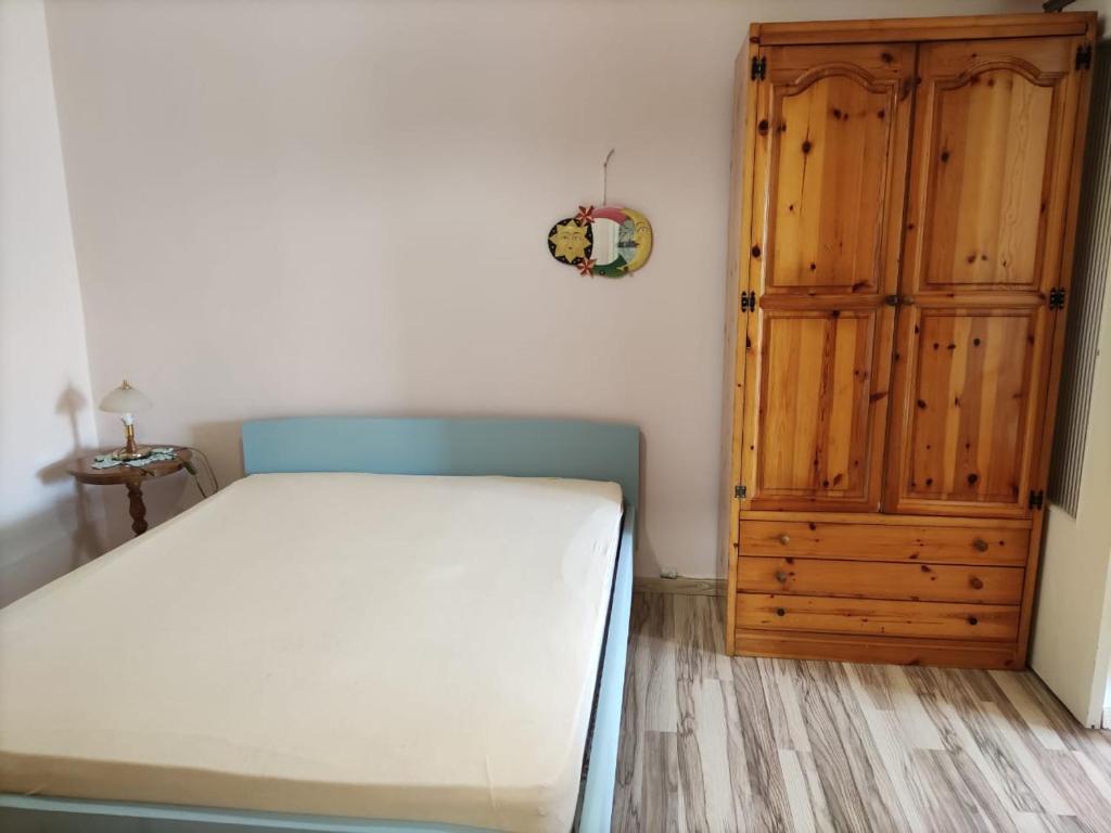 Postel nebo postele na pokoji v ubytování SISSY APARTMENT