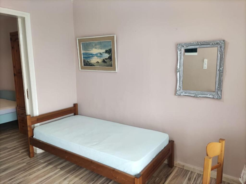 Postel nebo postele na pokoji v ubytování SISSY APARTMENT