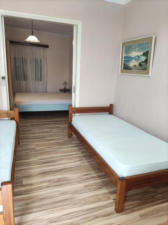 Postel nebo postele na pokoji v ubytování SISSY APARTMENT