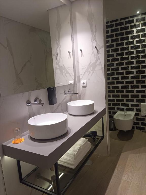 Koupelna v ubytování BrandApartments