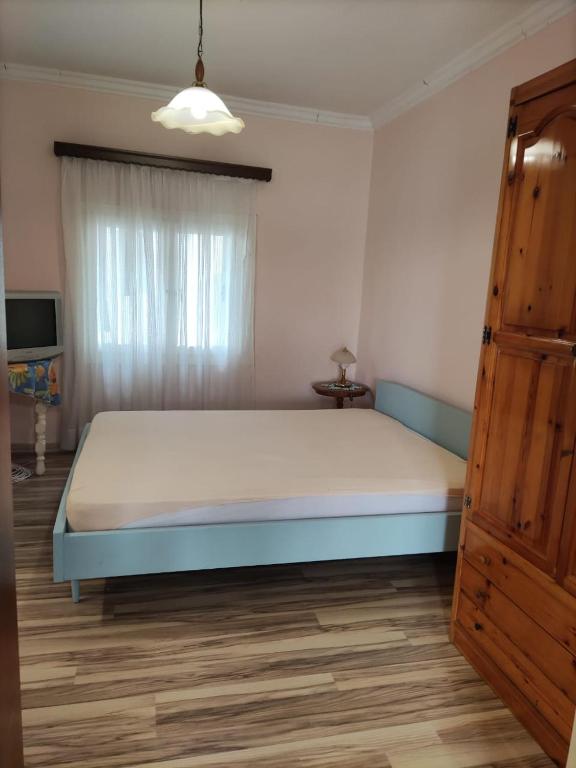 Postel nebo postele na pokoji v ubytování SISSY APARTMENT
