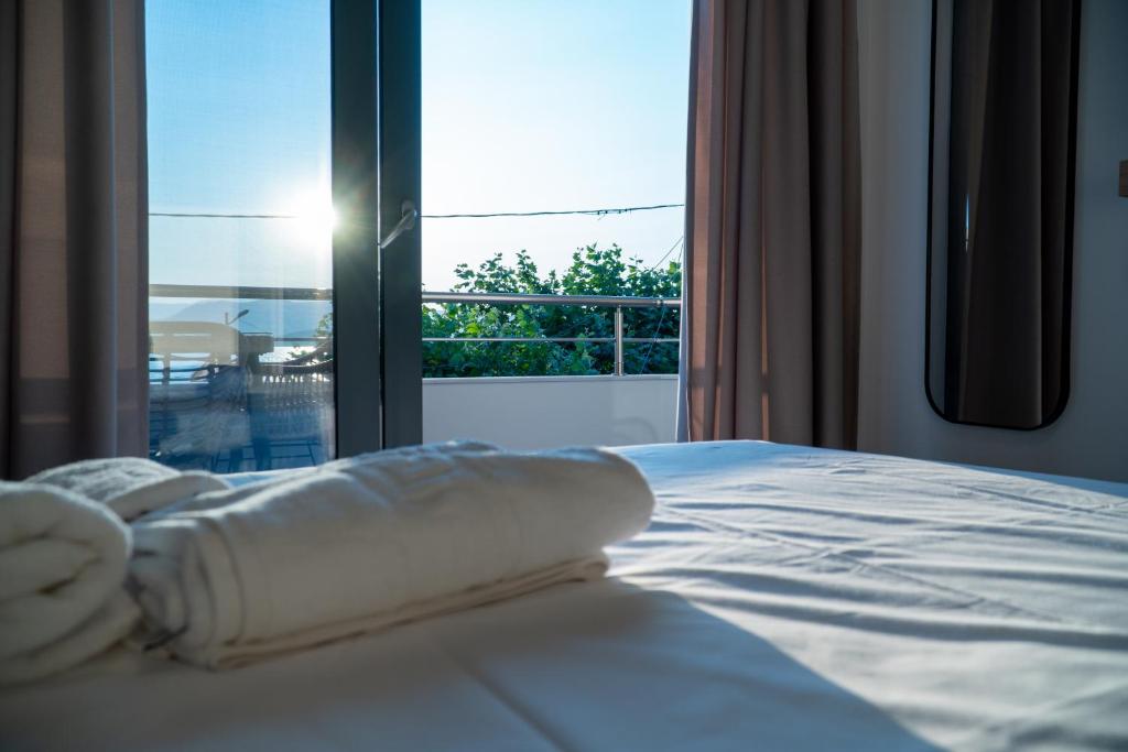 Postel nebo postele na pokoji v ubytování suite apartment Αdonis