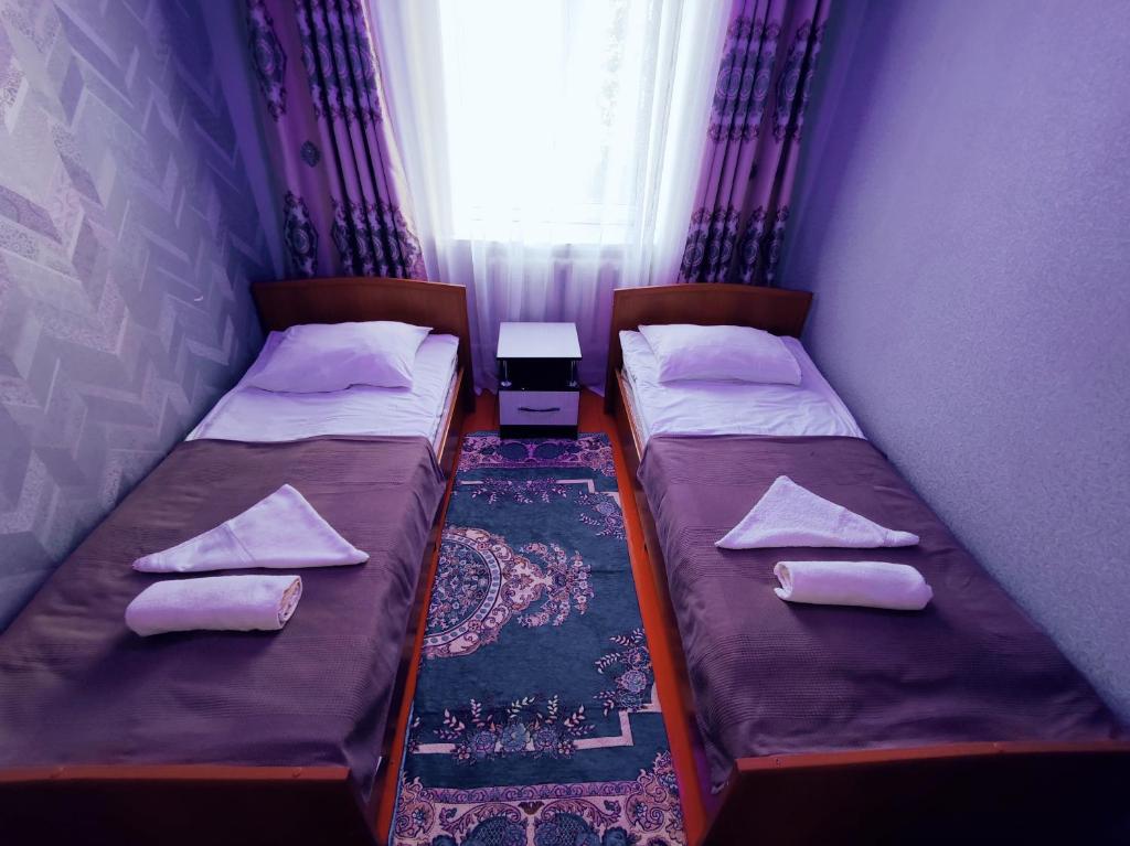 Postel nebo postele na pokoji v ubytování Guest House Adimi