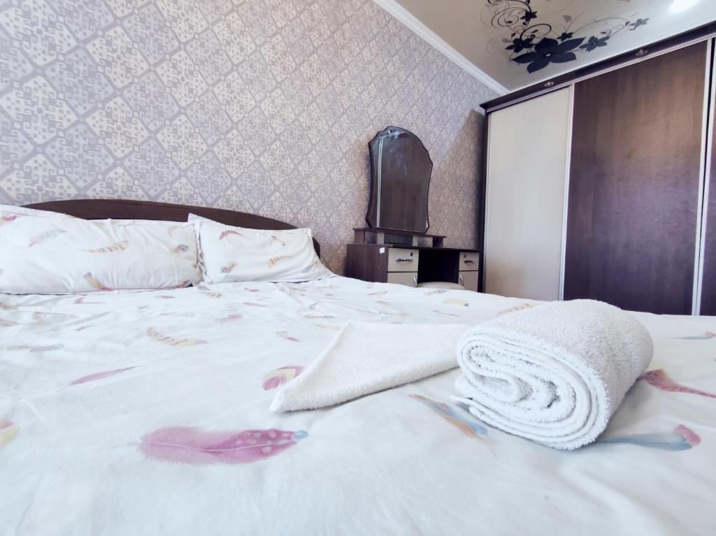 Postel nebo postele na pokoji v ubytování Guest House Adimi