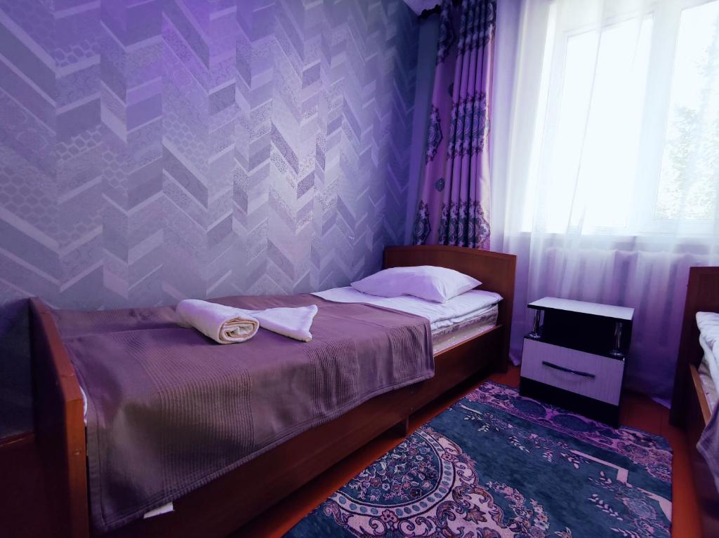 Postel nebo postele na pokoji v ubytování Guest House Adimi