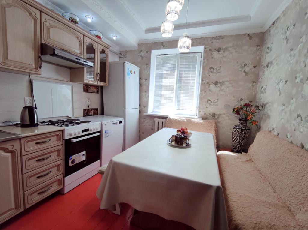 Kuchyň nebo kuchyňský kout v ubytování Guest House Adimi