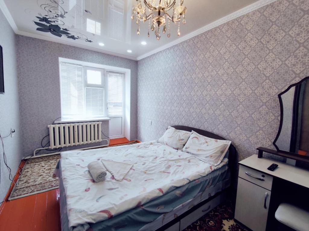 Postel nebo postele na pokoji v ubytování Guest House Adimi