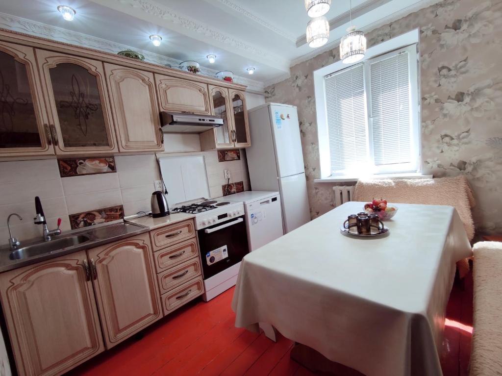 Kuchyň nebo kuchyňský kout v ubytování Guest House Adimi