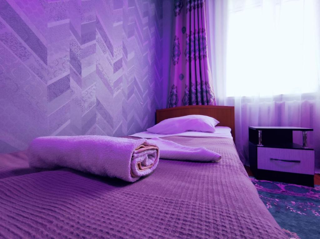 Postel nebo postele na pokoji v ubytování Guest House Adimi