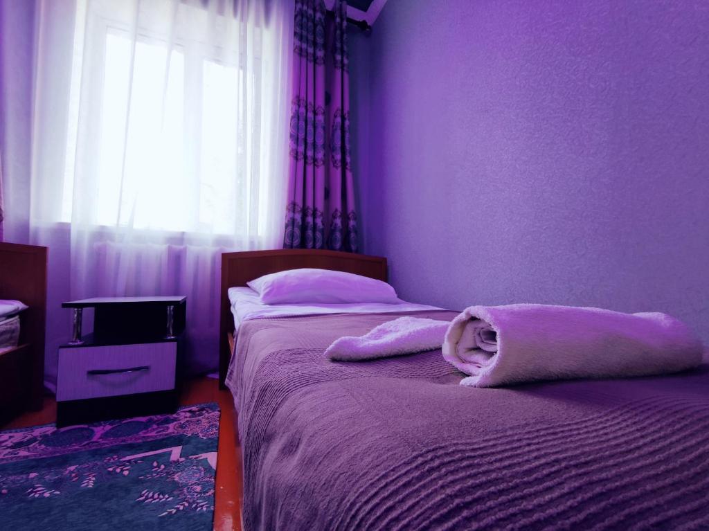 Postel nebo postele na pokoji v ubytování Guest House Adimi