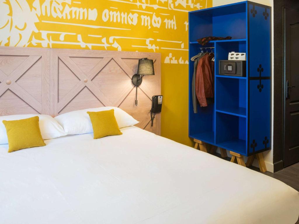 Postel nebo postele na pokoji v ubytování ibis Styles Carcassonne La Cité
