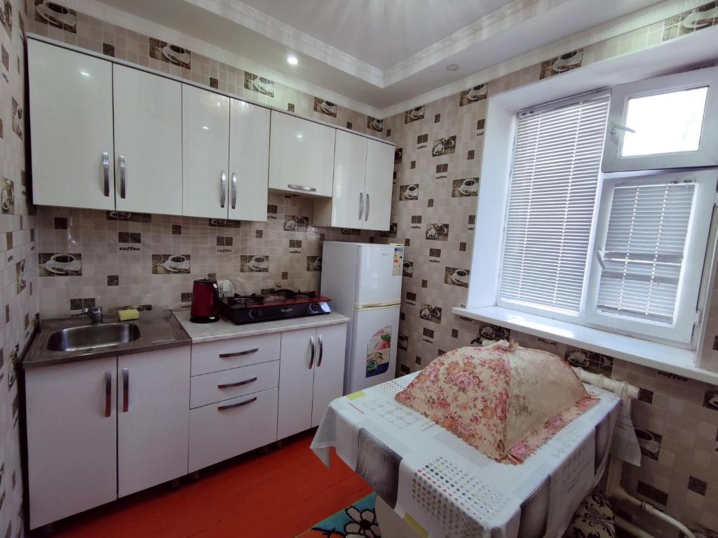 Kuchyň nebo kuchyňský kout v ubytování Guest House Adimi