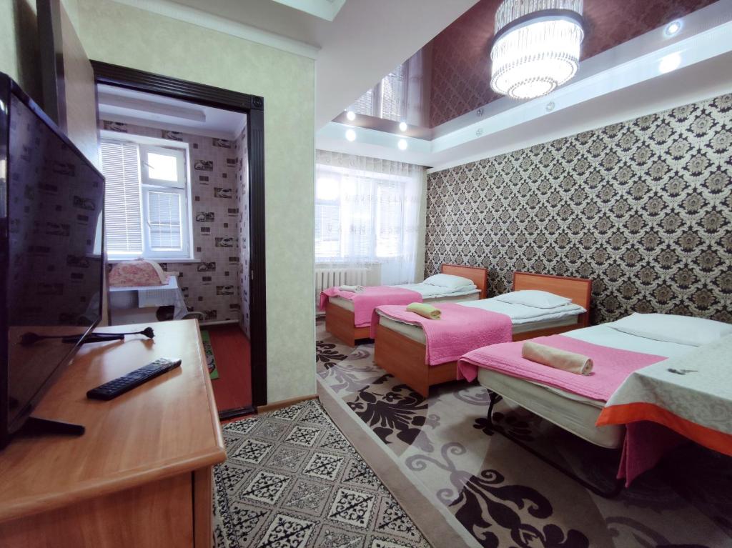 TV a/nebo společenská místnost v ubytování Guest House Adimi