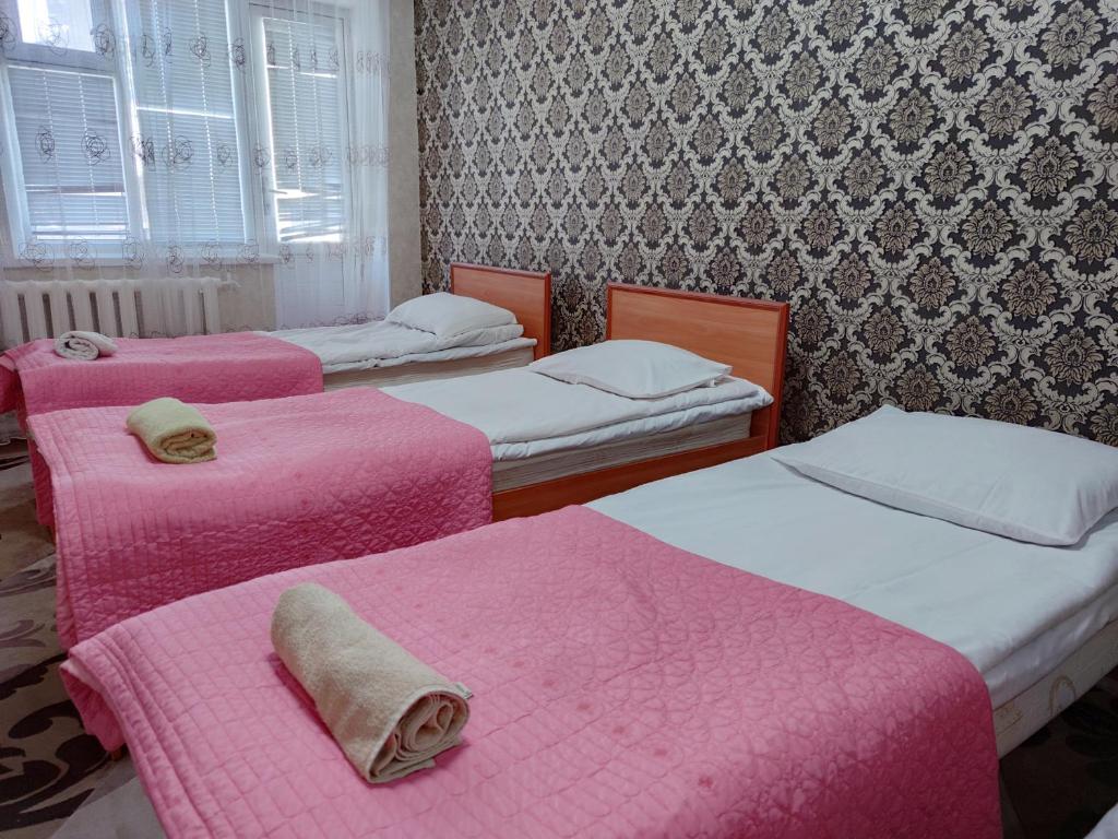 Postel nebo postele na pokoji v ubytování Guest House Adimi