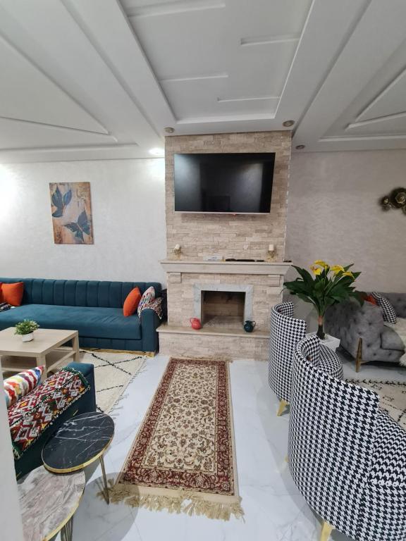 TV a/nebo společenská místnost v ubytování Villa de luxe