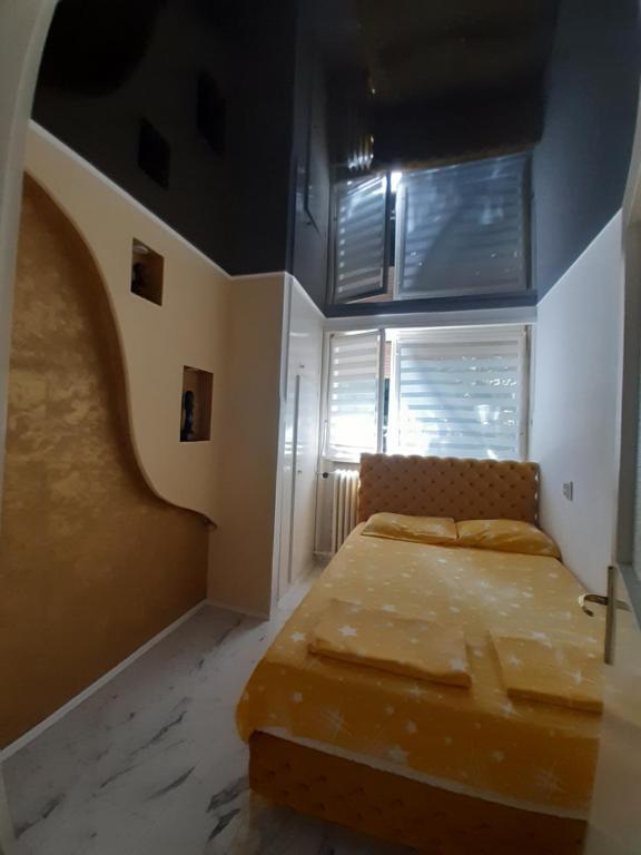 Ένα ή περισσότερα κρεβάτια σε δωμάτιο στο Apartman brdo