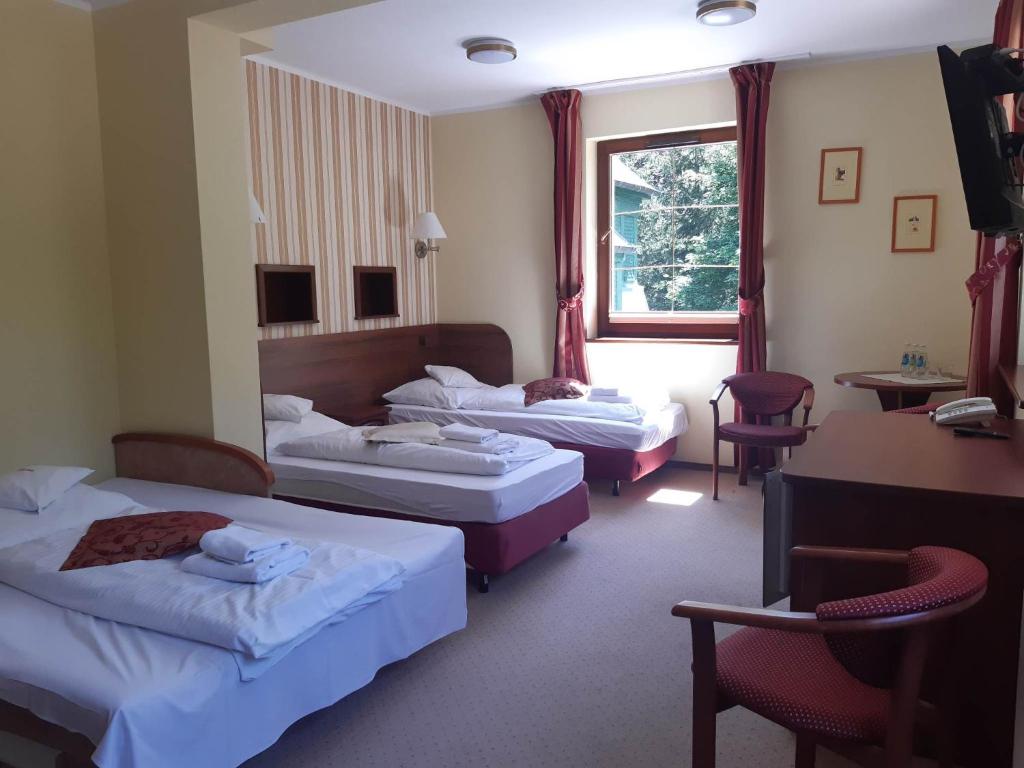 Posteľ alebo postele v izbe v ubytovaní Villa Wernera Hotel & Spa