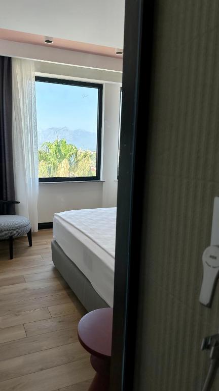 Postel nebo postele na pokoji v ubytování Just Inn City