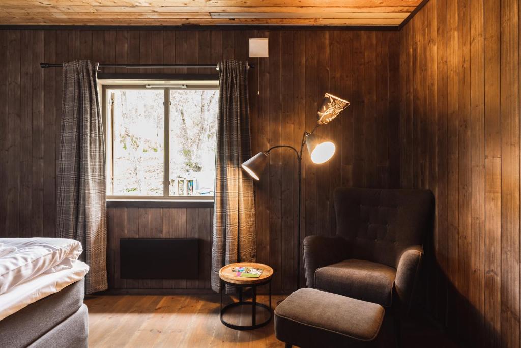Postel nebo postele na pokoji v ubytování Gulbrakka Basecamp