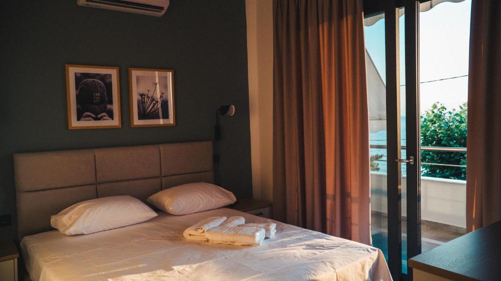 Postel nebo postele na pokoji v ubytování suite apartment Αdonis