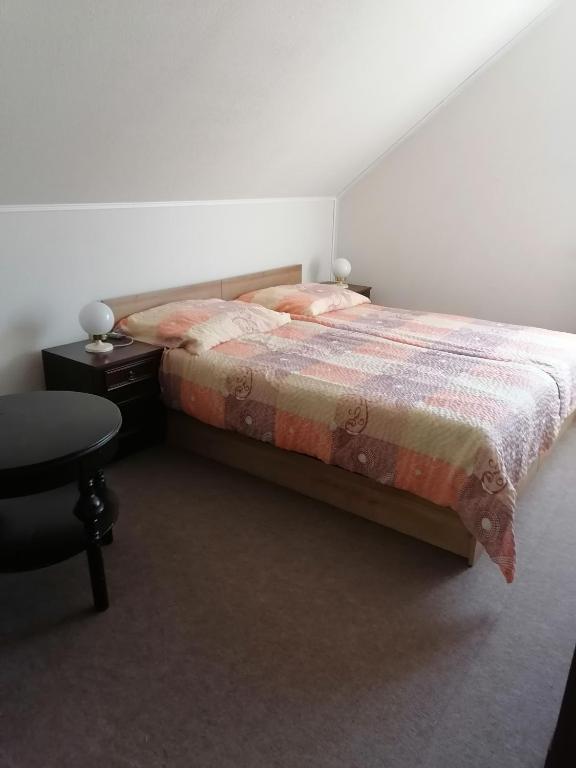 Postel nebo postele na pokoji v ubytování ubytování v apartmánu