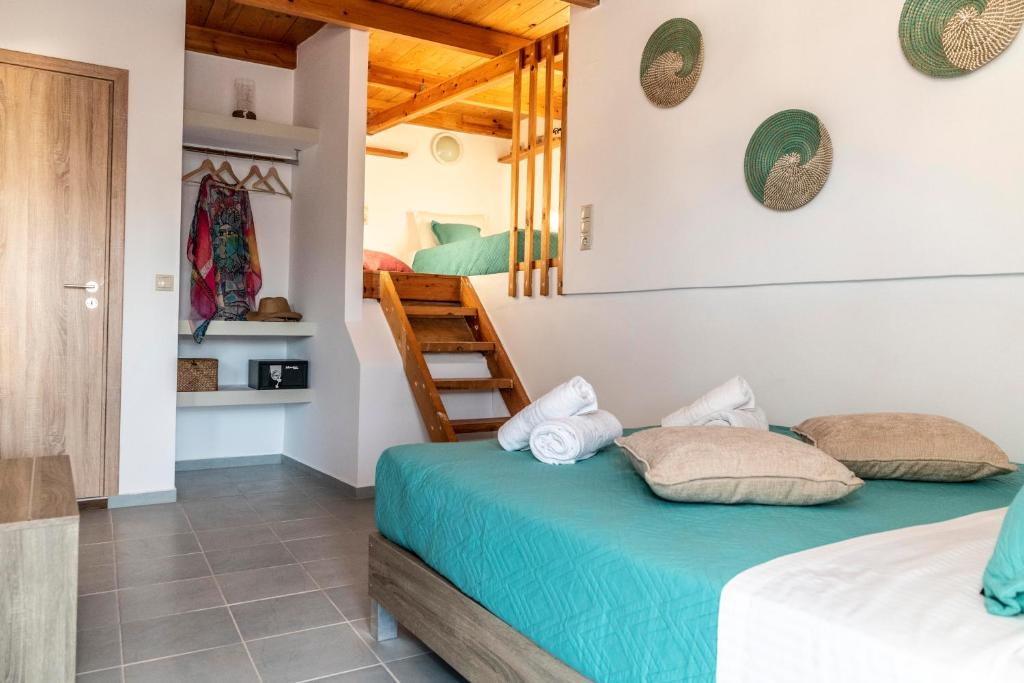 Postel nebo postele na pokoji v ubytování Emmanouela Apartment