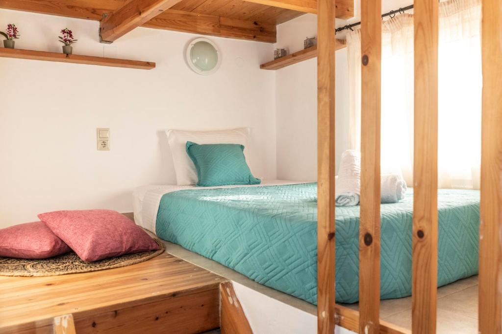 Postel nebo postele na pokoji v ubytování Emmanouela Apartment