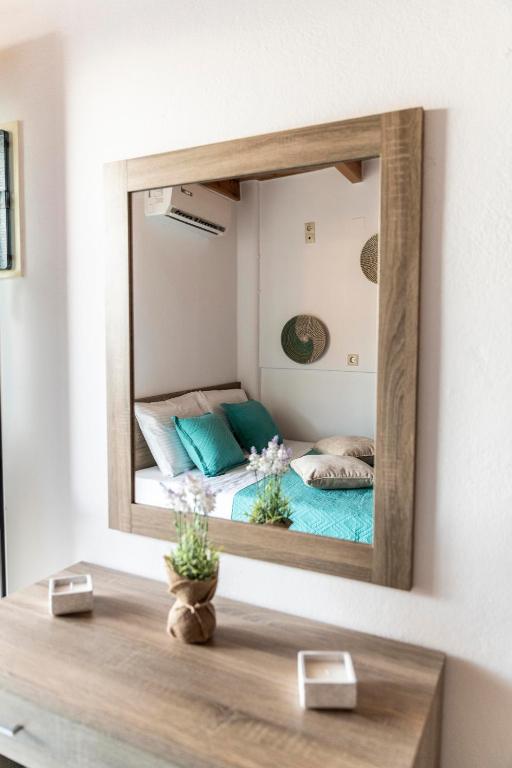 Postel nebo postele na pokoji v ubytování Emmanouela Apartment