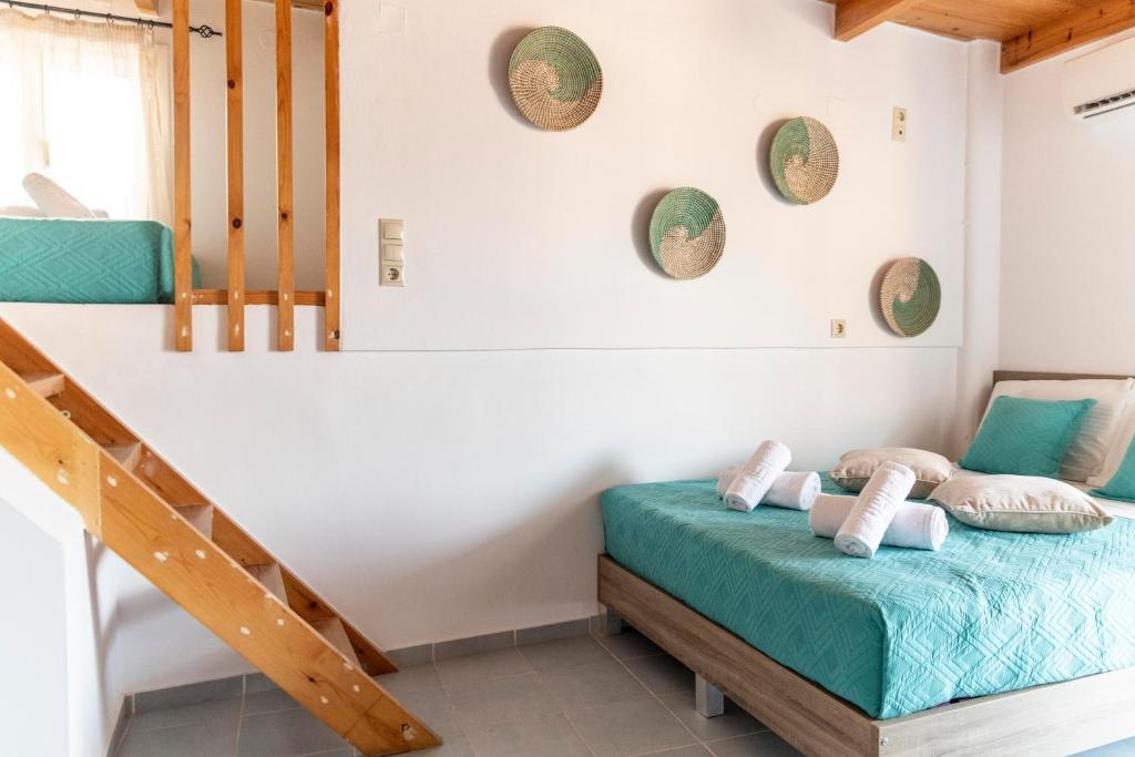 Postel nebo postele na pokoji v ubytování Emmanouela Apartment