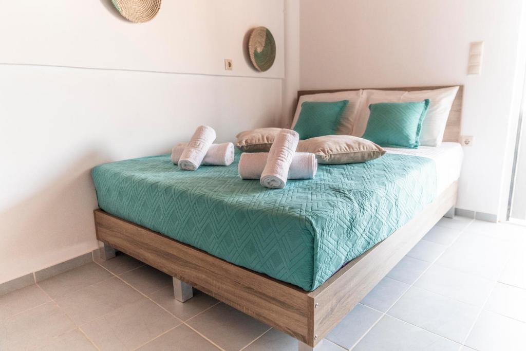 Postel nebo postele na pokoji v ubytování Emmanouela Apartment