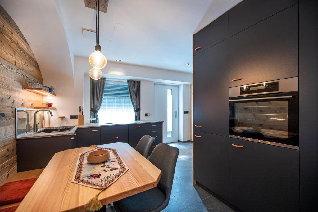 A kitchen or kitchenette at Apartments Smidl