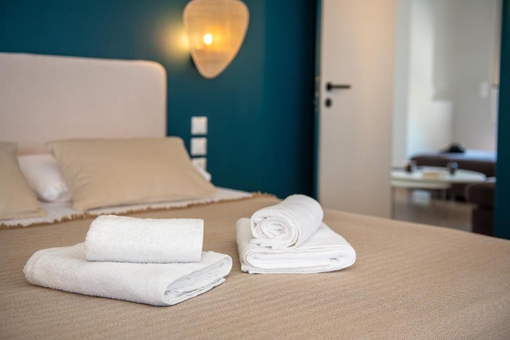 Postel nebo postele na pokoji v ubytování fragoseco loft! Elegance & Luxury