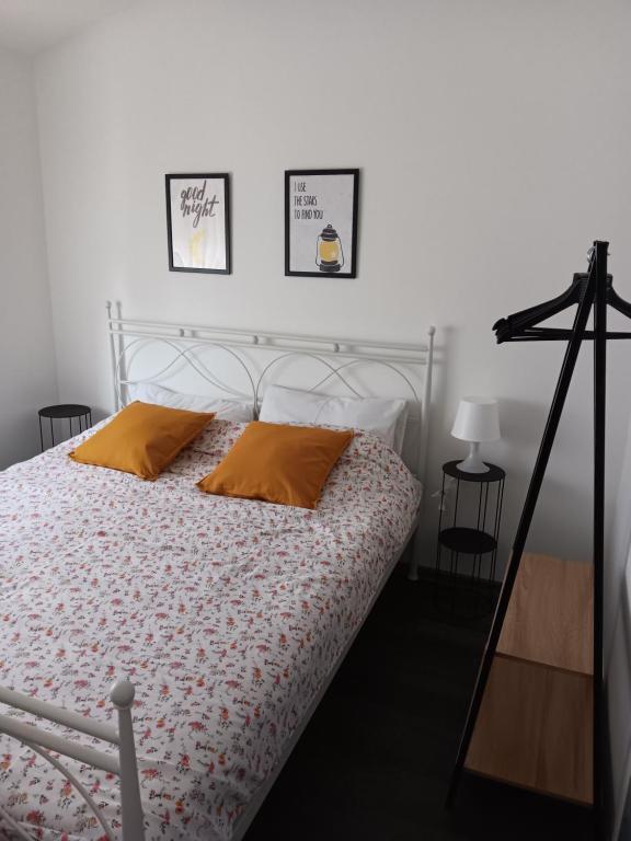Postel nebo postele na pokoji v ubytování Apartman Dunav