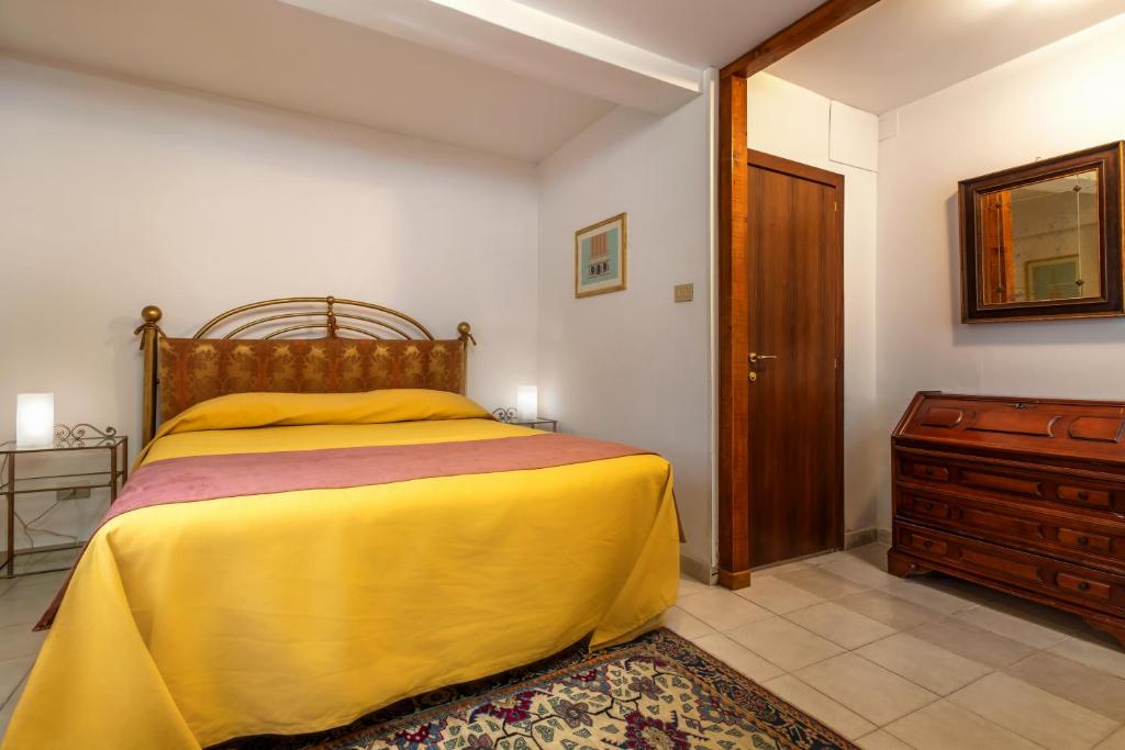 Postel nebo postele na pokoji v ubytování Hotel Casa Boccassini