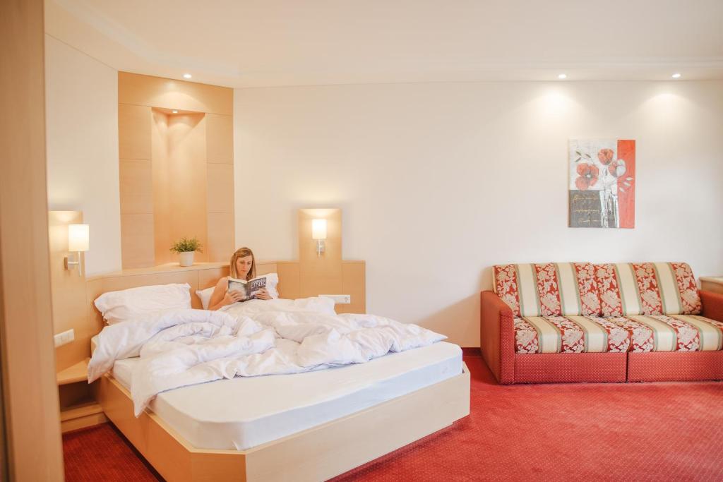 Postel nebo postele na pokoji v ubytování Hotel Elisabeth