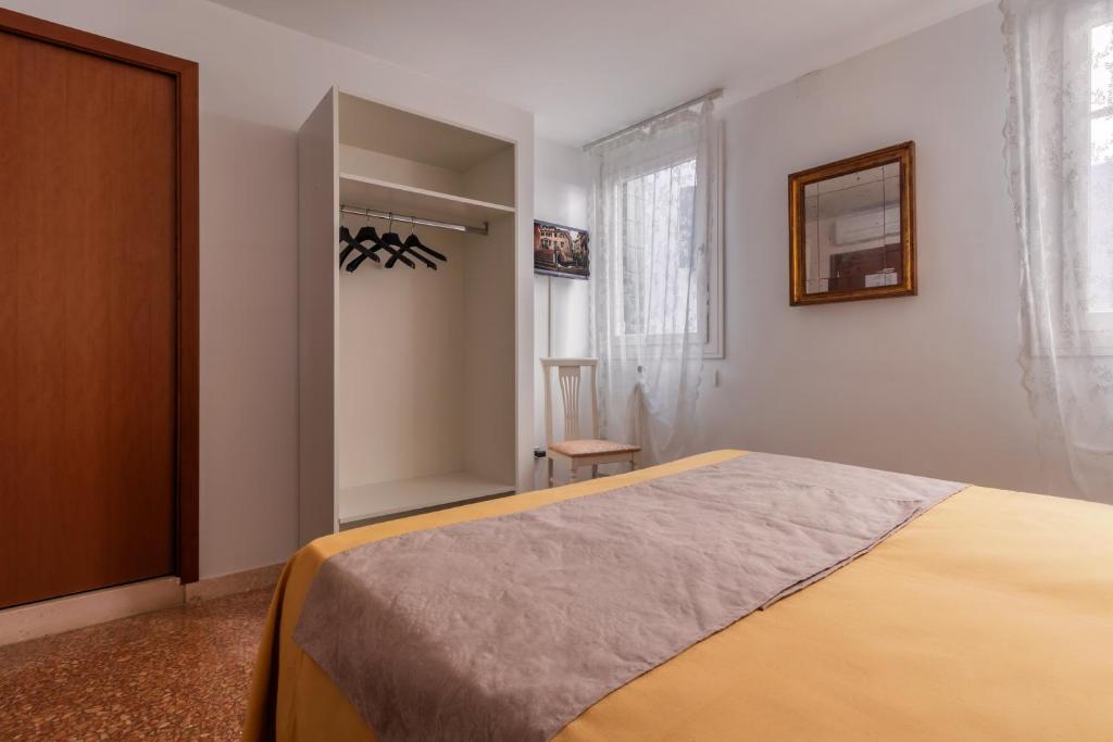 Postel nebo postele na pokoji v ubytování Hotel Casa Boccassini