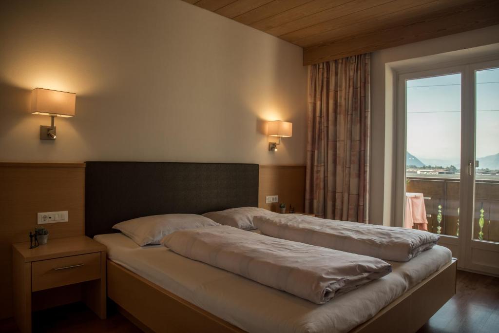Postel nebo postele na pokoji v ubytování Hotel Elisabeth