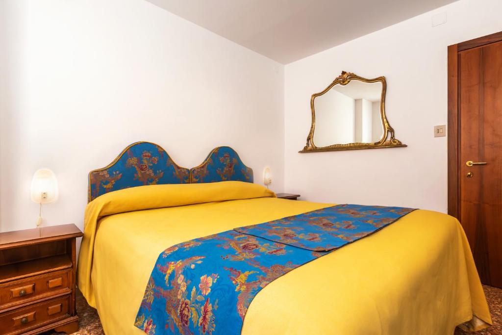 Postel nebo postele na pokoji v ubytování Hotel Casa Boccassini