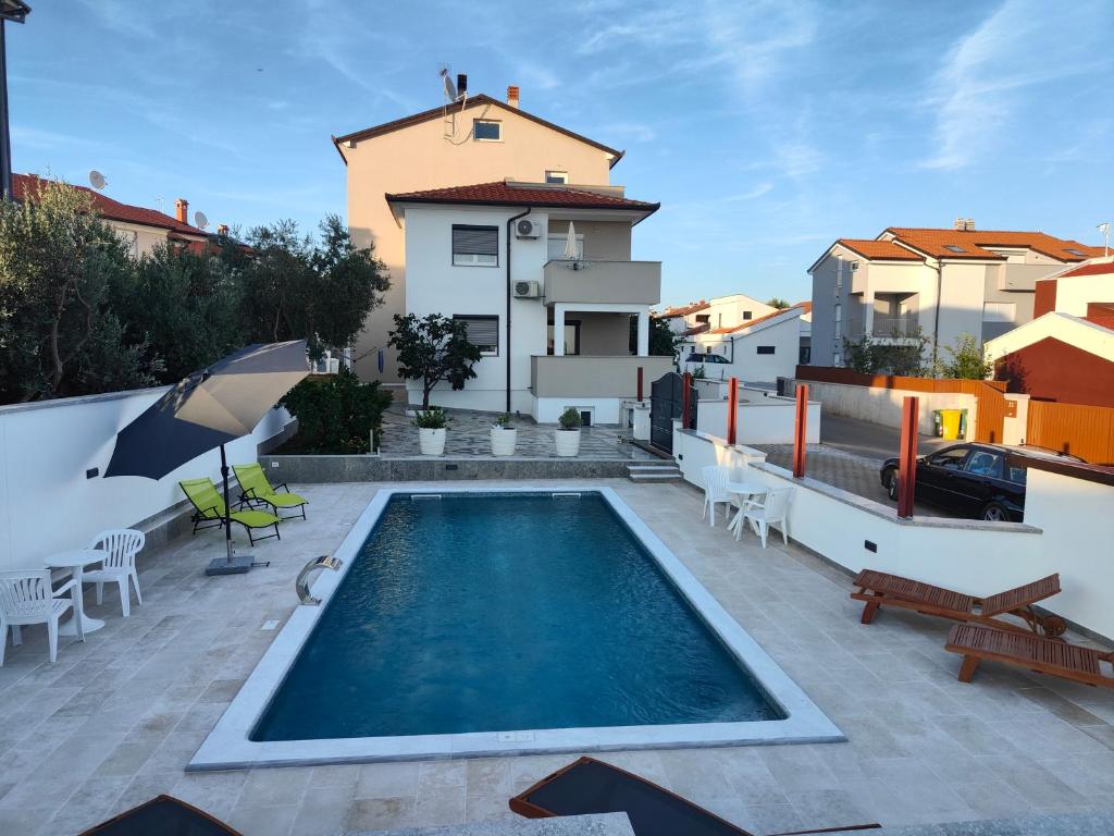 Swimmingpoolen hos eller tæt på Apartments Ivana with the pool