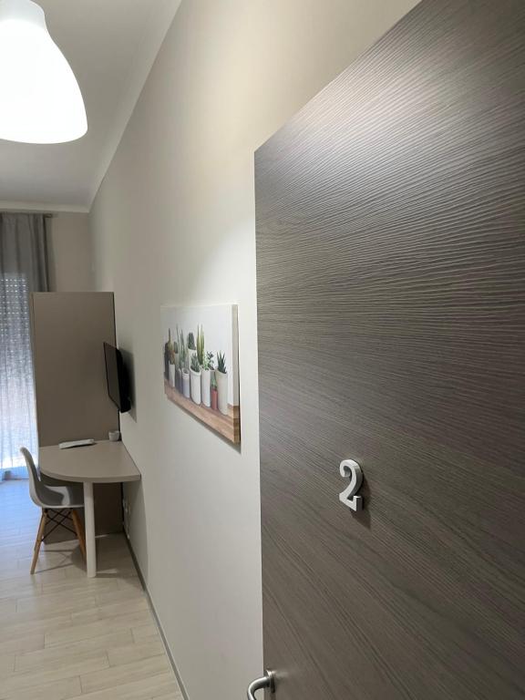 TV a/nebo společenská místnost v ubytování B&B L’ALTRAMURGIA