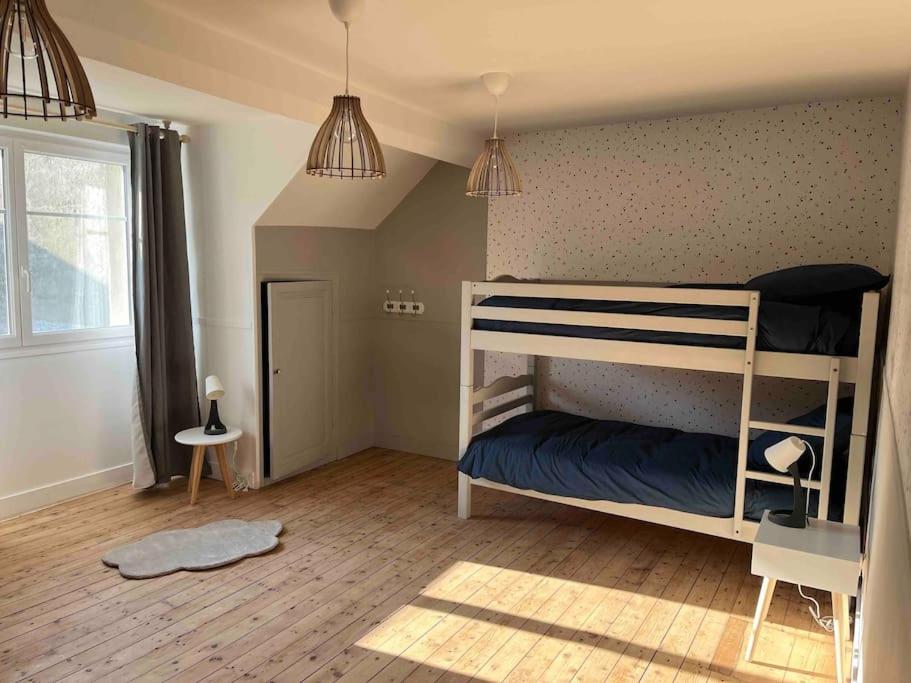 Poschodová posteľ alebo postele v izbe v ubytovaní La Belle du Val
