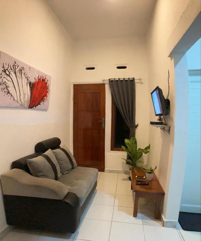 TV a/nebo společenská místnost v ubytování LOPE HOMESTAY