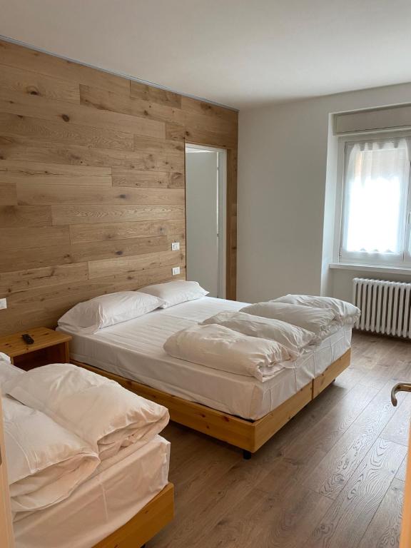 Posteľ alebo postele v izbe v ubytovaní Residence Arnica