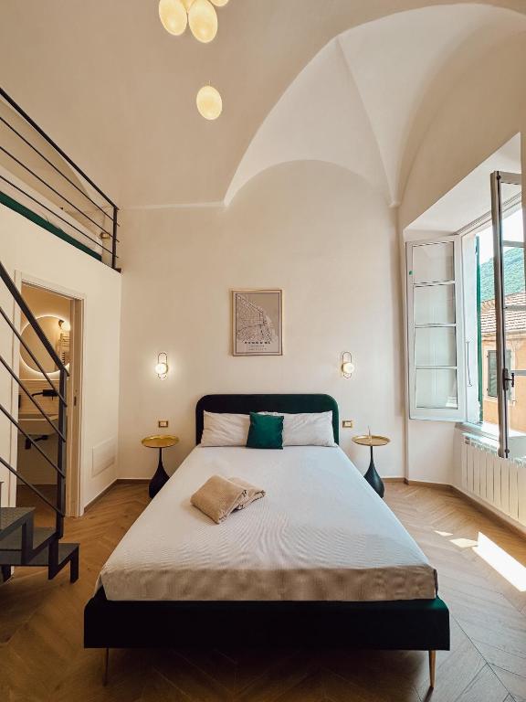 Ένα ή περισσότερα κρεβάτια σε δωμάτιο στο Alto Borgo Rooms